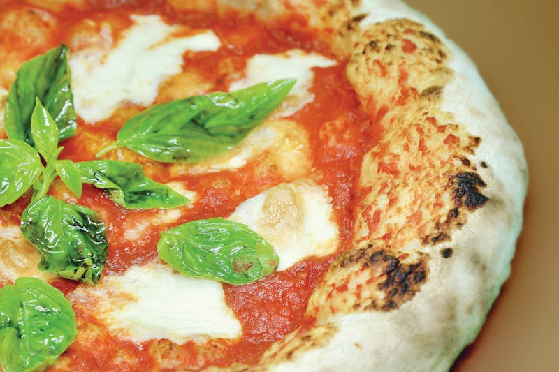 Pizzana authentic Neapolitan Margherita pizza with fresh basil